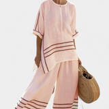 Magdalena – top asimetric, sofisticat cu dungi și pantaloni îndrăzneți