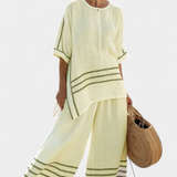 Magdalena – top asimetric, sofisticat cu dungi și pantaloni îndrăzneți